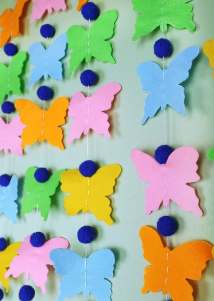 Handgemaakte garland op kleur achtergrond — Stockfoto