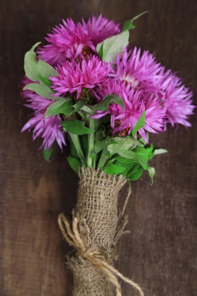 Cornflowers on wooden background — Stock Photo, Image