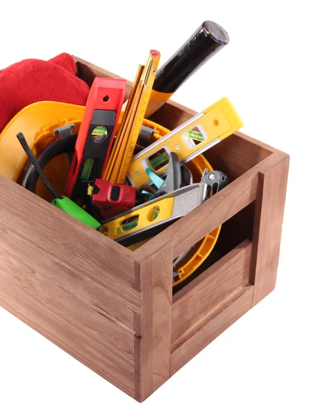 Wooden box with different tools, isolated on white — Stock Photo, Image