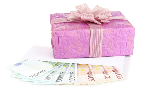 Gift box with money isolated on white — Stock Photo, Image