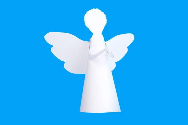 Christmas angel on light blue background — Stock Photo, Image