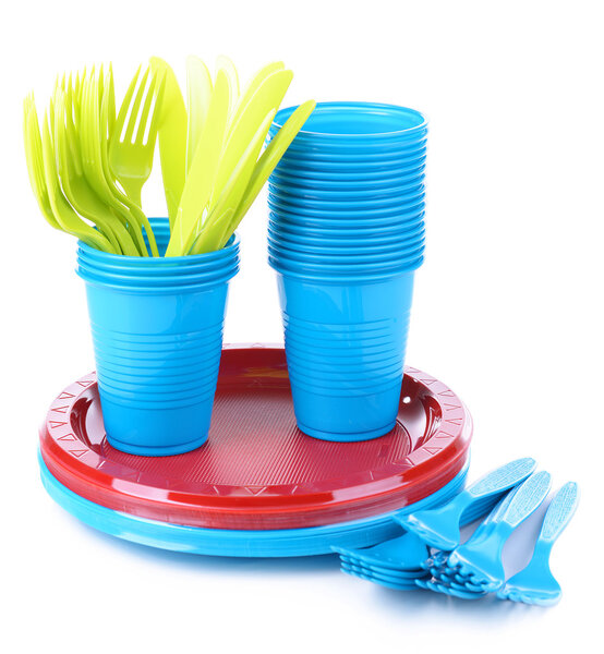 Bright plastic tableware isolated on white