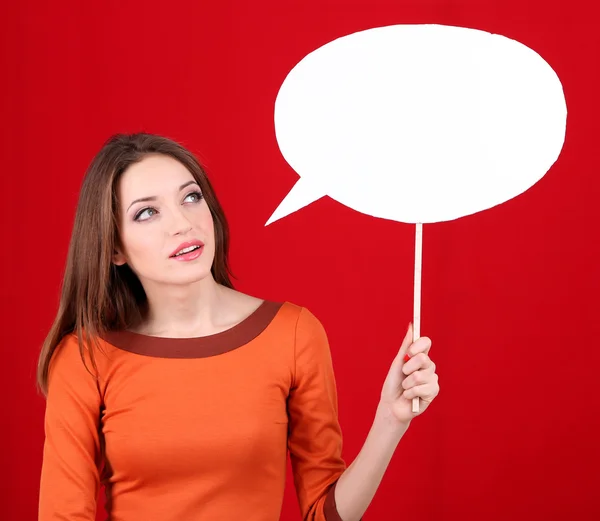 Attractive woman  on red background — Stock Photo, Image