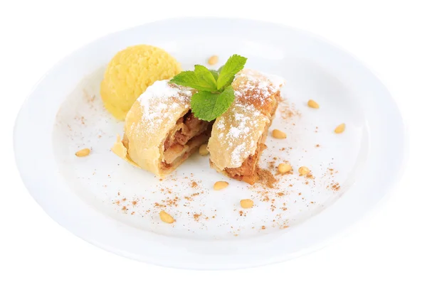 Tasty homemade strudel with mint leaves and ice-cream on plate isolated on white — Stock Photo, Image