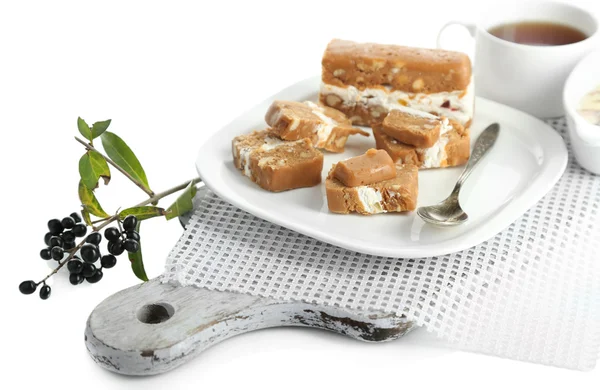 Sherbet con nueces en plato aislado en blanco —  Fotos de Stock