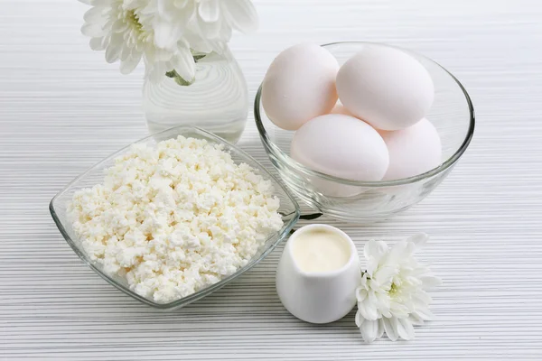 Tasty dairy products on wooden table — Stock Photo, Image