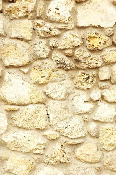 Стена из старых камней — стоковое фото