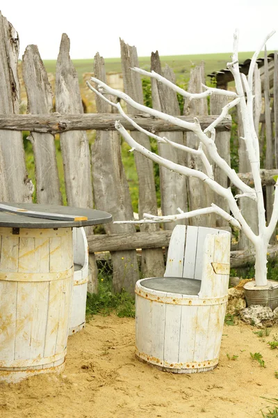 Old wooden pail in garden — Stock Photo, Image