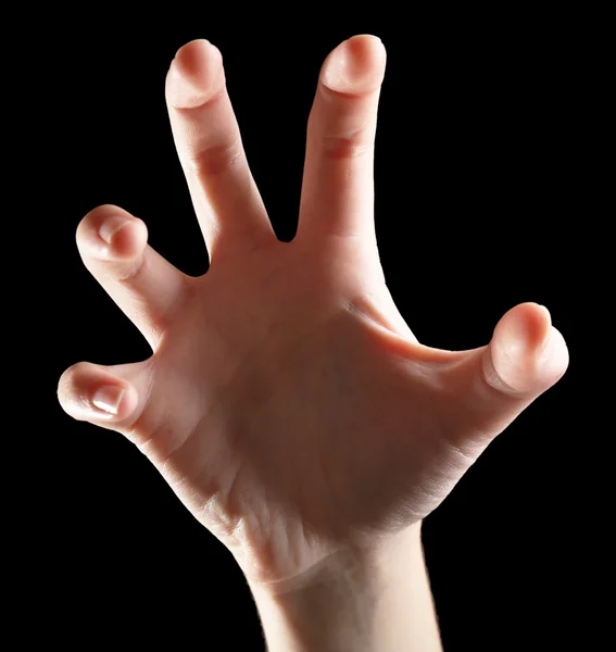 Human hand on black background — Stock Photo, Image