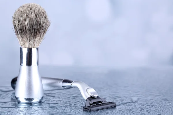 Shaving accessories on table on bright background — Stock Photo, Image