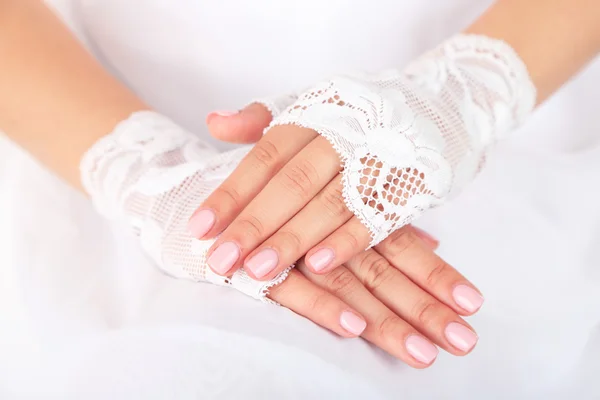 Wedding gloves on hands of bride, close-up — Stock Photo, Image