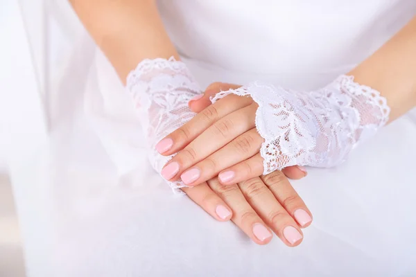 Wedding gloves on hands of bride, close-up — Stock Photo, Image