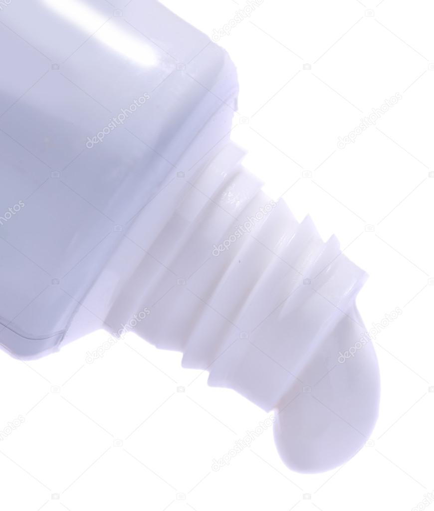 Toothpaste squeezed from tube, close-up, isolated on white 