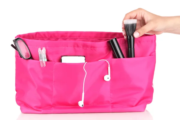 Pink cosmetic bag and female hand isolated on white — Stock Photo, Image