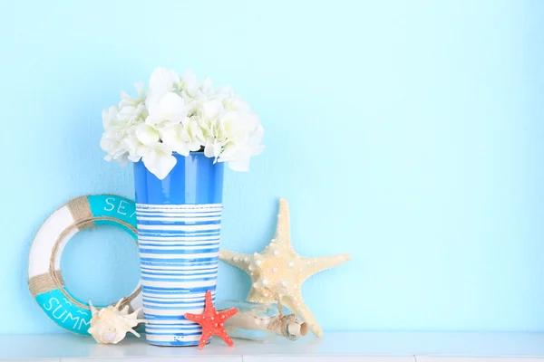 Composition of marine items on blue background — Stock Photo, Image