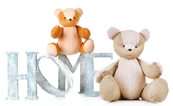 Decoratieve brieven woord Home vormen met teddy beer geïsoleerd op wit — Stockfoto