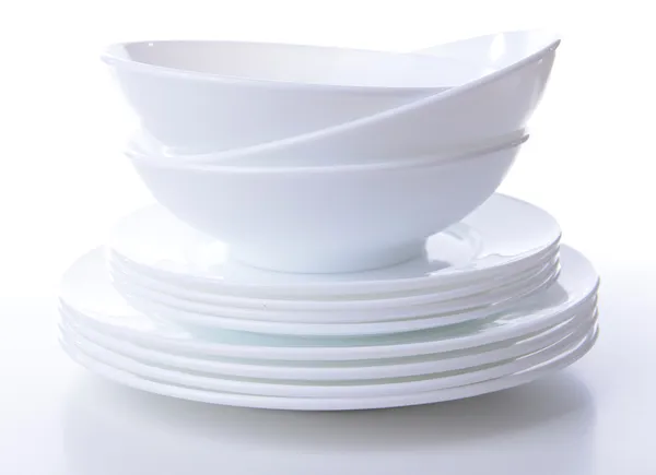 Set de platos blancos aislados sobre blanco — Foto de Stock