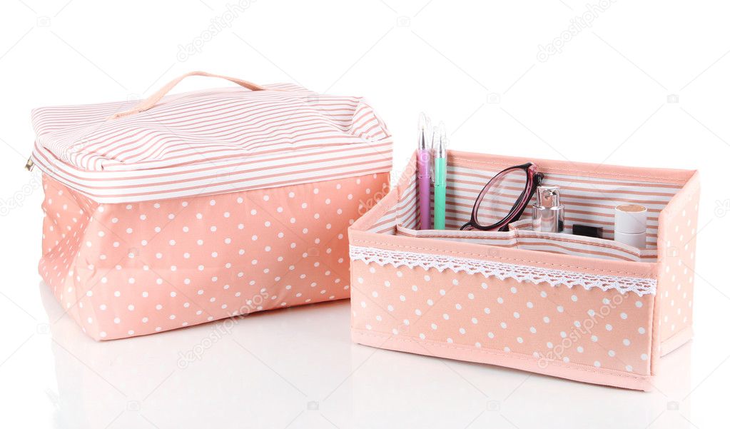 Colorful cosmetic bag with polka dots isolated on white