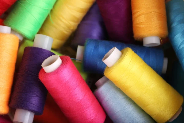 Multicolor sewing threads background — Stock Photo, Image