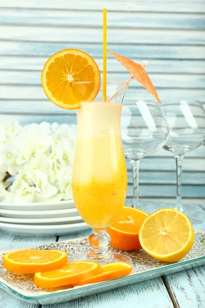 Delicious fruit smoothie on wooden table, close up — Stock Photo, Image