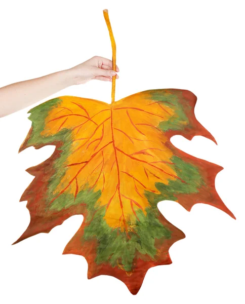 Decorative maple leaf in hand isolated on white — Stock Photo, Image