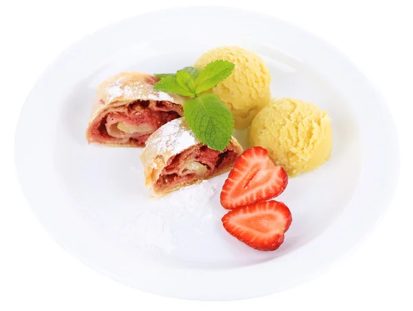 Tasty homemade strudel with ice-cream, fresh strawberry and mint leaves isolated on white — Stock Photo, Image