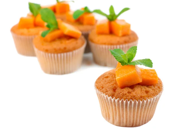 Tasty pumpkin muffins, isolated on white — Stock Photo, Image