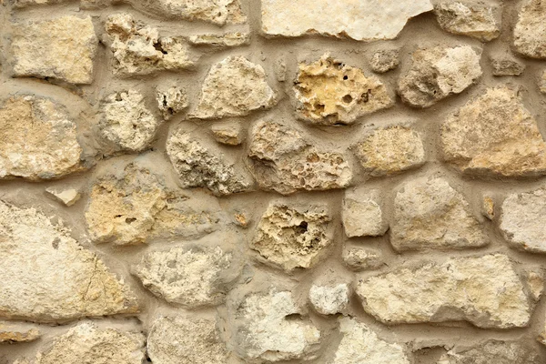 Стена из старых камней — стоковое фото