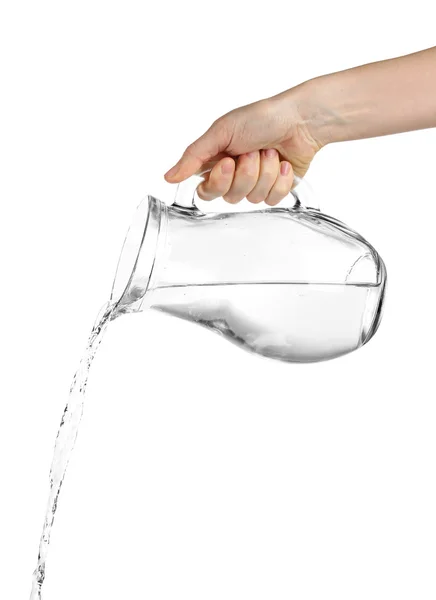 Derramando água de jarro de vidro, isolado em branco — Fotografia de Stock