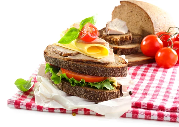 Heerlijke broodjes met voldoen aan op tabel close-up — Stockfoto