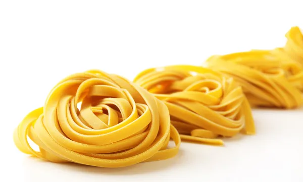 Raw homemade pasta, isolated on white — Stock Photo, Image