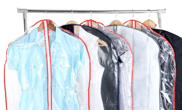 Office vrouwelijke kleding in gevallen voor het opslaan op hangers, geïsoleerd op wit — Stockfoto