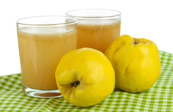 Sweet quince with juice on table on white background — Stock Photo, Image