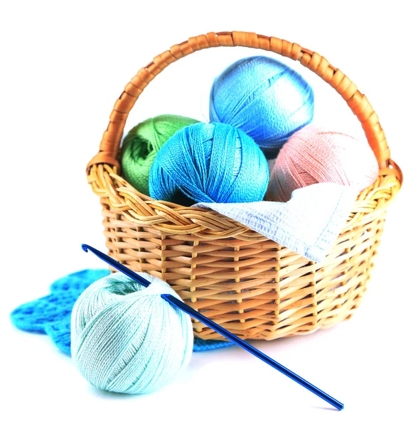 Colorful yarn for knitting with napkin in wicker basket and crochet hook, isolated on white — Stock Photo, Image