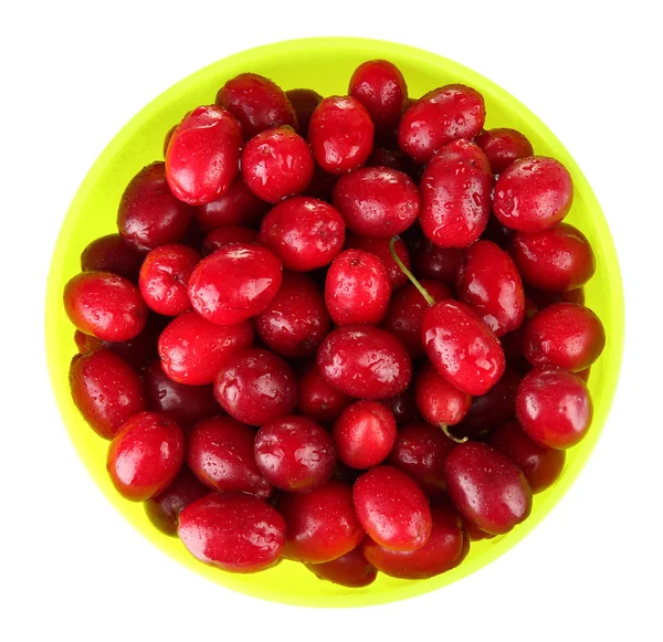 Fresh cornel berries in bowl isolated on white — Stock Photo, Image