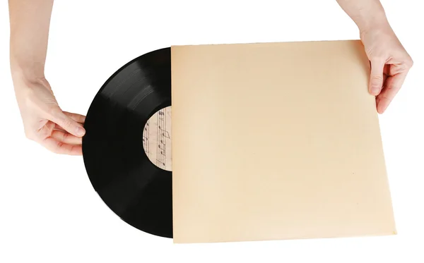 Manos sosteniendo viejo disco de vinilo en estuche de papel, aislado en blanco — Foto de Stock