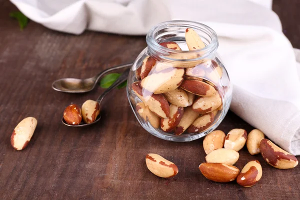 Tasty brasil nuts on wooden background — Stock Photo, Image