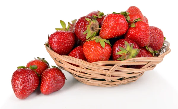 Ripe sweet strawberries in wicker basket isolated on white — Stock Photo, Image
