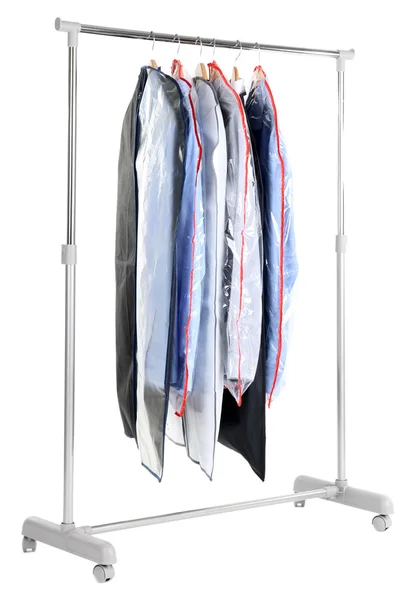 Camisas masculinas de escritório em casos para armazenar em cabides, isolados em branco — Fotografia de Stock