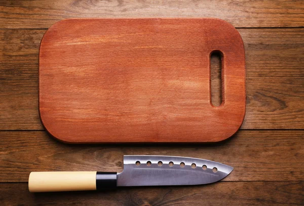 Pisau dapur dengan latar belakang kayu — Stok Foto