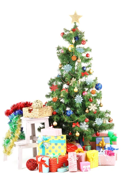 Decorated Christmas tree with gifts isolated on white — Stock Photo, Image