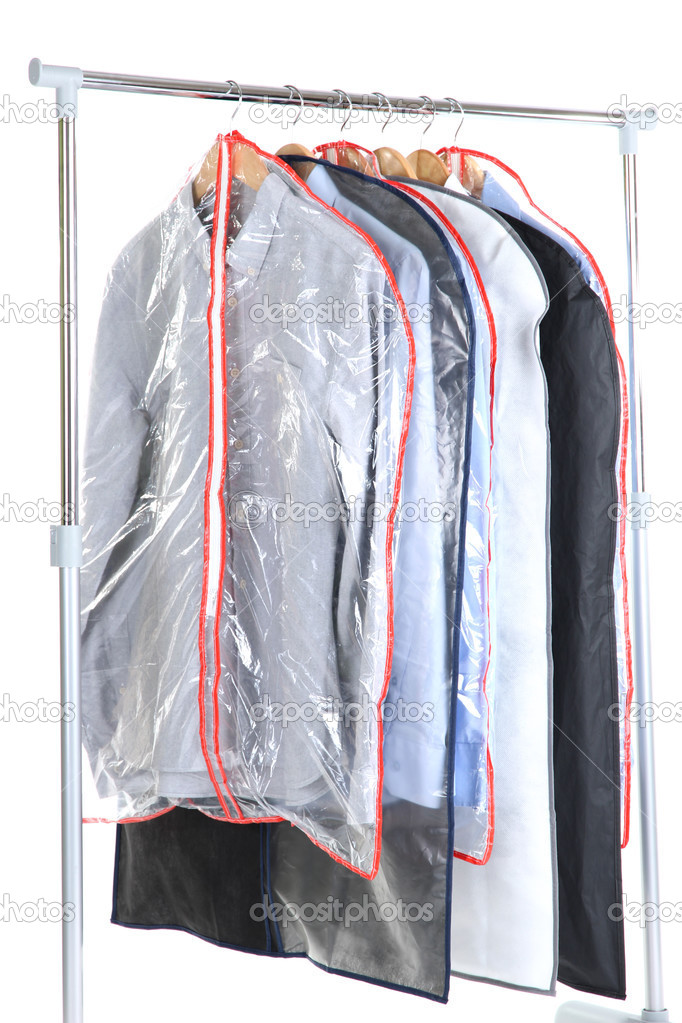 Office male shirts in cases for storing on hangers, isolated on white