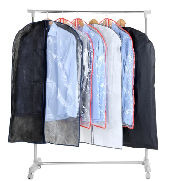 Camisas masculinas de escritório em casos para armazenar em cabides, isolados em branco — Fotografia de Stock