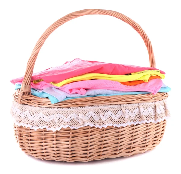 Bright clothes in laundry basket, isolated on white — Stock Photo, Image