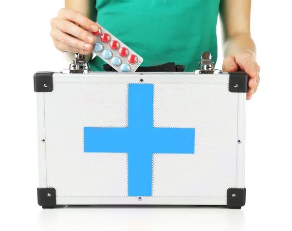 Woman holding first aid kit, isolated on white — Stock Photo, Image