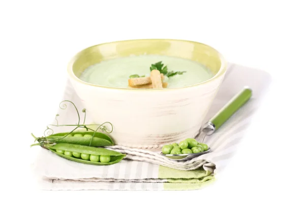 Soupe de pois savoureux, isolée sur du blanc — Photo