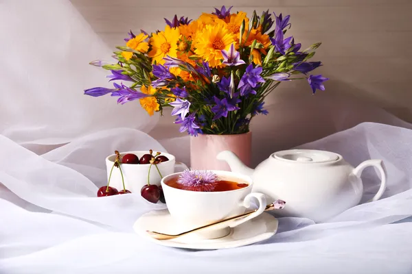 Cup of fresh herbal tea on table — Stock Photo, Image