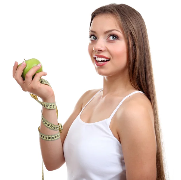 Beautiful girl with apple and measuring tape — Stock Photo, Image