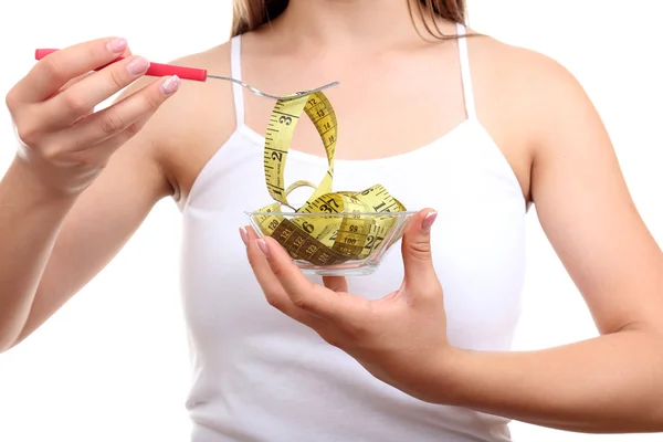 Beautiful girl with measuring tape in bowl — Stock Photo, Image