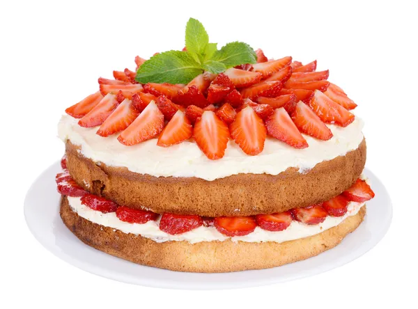 Delicious biscuit cake with strawberries isolated on white — Stock Photo, Image
